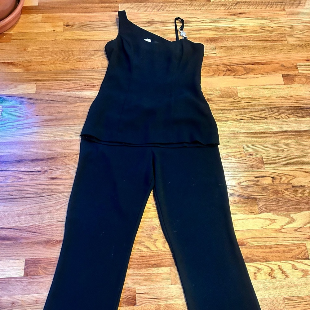 MODA INTL  Black Women's Pant Set with one strap shoulder  
Size 12